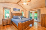Upper Level Master Suite Features King Bed, Flat Screen Tv, Private Bath, and Access to Private Covered Deck